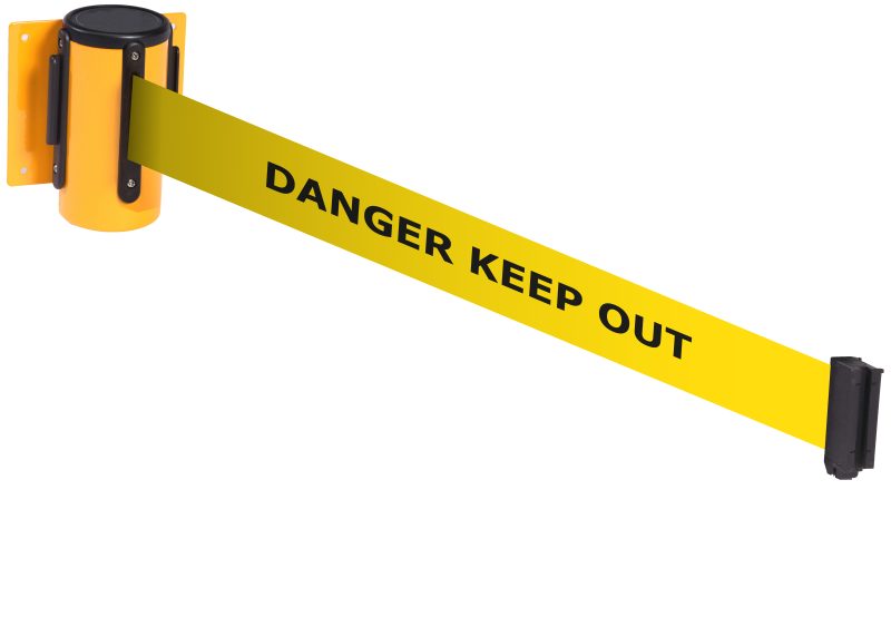 Yellow wall-mounted retractable belt reading “DANGER KEEP OUT”.