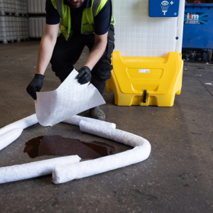 Long yellow and galvanised storage container with corrugated sides and side door